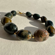 Bracelet made of natural jasper with a silver clasp in gilding