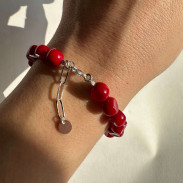 Natural coral bracelet with a silver clasp