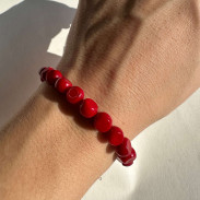 Natural coral bracelet with a silver clasp