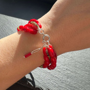  Multi-row bracelet made of natural coral with zircon