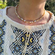 Choker made of natural mother-of-pearl on a silver-gilt clasp 