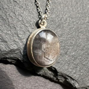 Pendant with natural corundum made of silver