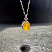 Pendant with natural yellow sapphire made of silver on a chain