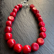 Natural coral bracelet with a silver clasp