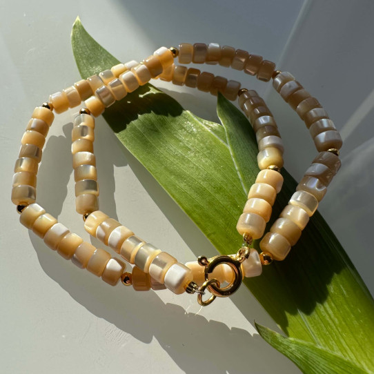 Choker made of natural mother-of-pearl on a silver-gilt clasp 