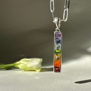 Silver pendant with gems