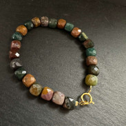 Natural jasper bracelet with a gold-plated lock