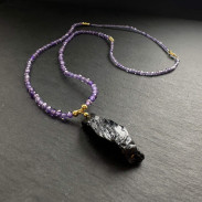 Natural black tourmaline pendant on a zircon necklace