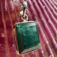 Pendant with natural emerald made of silver
