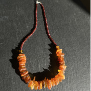 Necklace made of natural raw Amber on a choker made of natural Garnet Hessonite