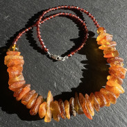 Necklace made of natural raw Amber on a choker made of natural Garnet Hessonite