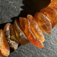 Necklace made of natural raw Amber on a choker made of natural Garnet Hessonite