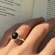 Ring with black star diopside in silver