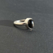 Ring with black star diopside in silver